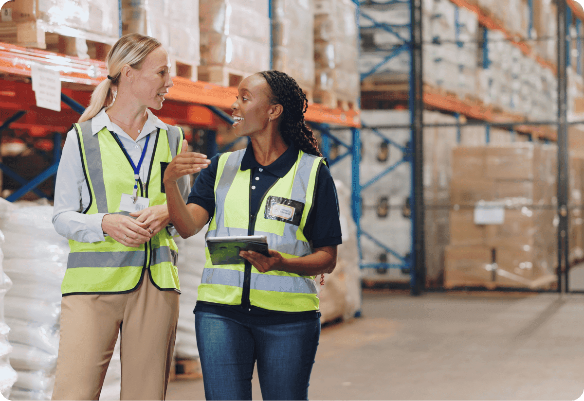 Two people talking about warehouse automation