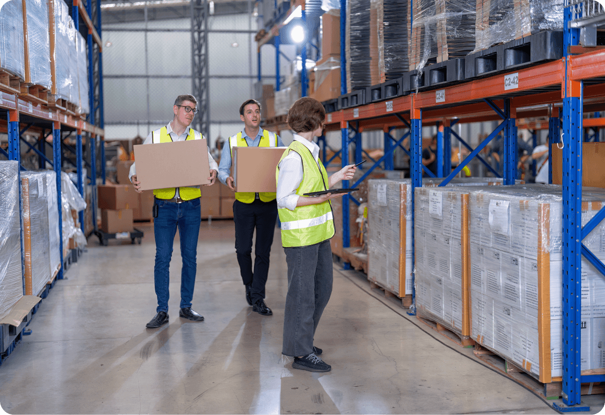 Three employees talking about the supplier network