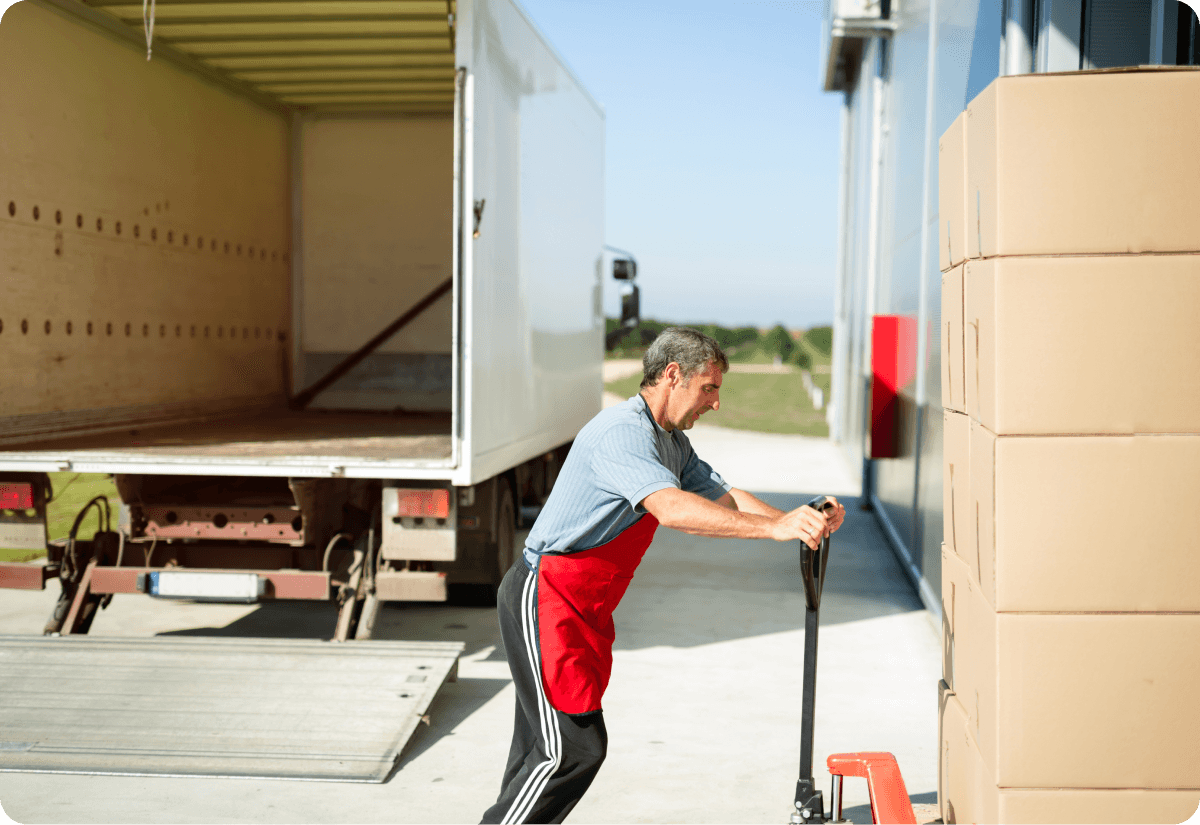 warehouse worker transporting cargo to warehouse is an example of a fulfillment partner that improves logistics