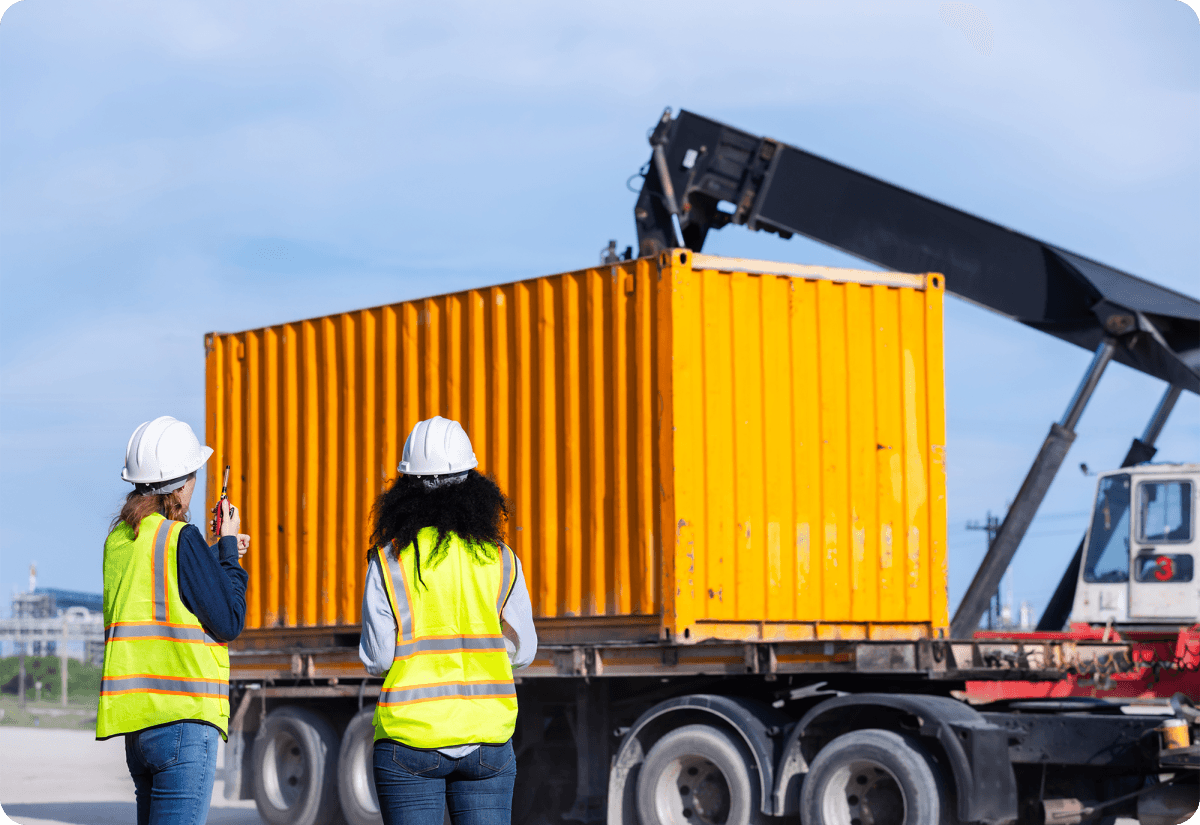 two logistics workers from a company that decided to outsource logistics