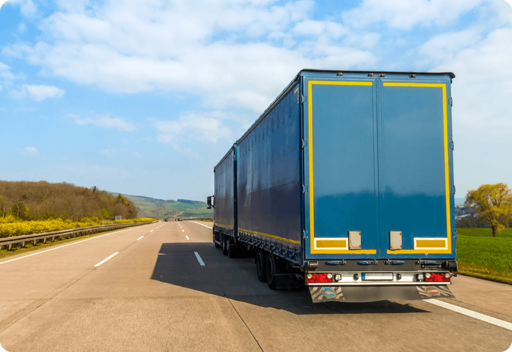 Refrigerated truck on a highway supporting cold chain integrity across the supply chain.